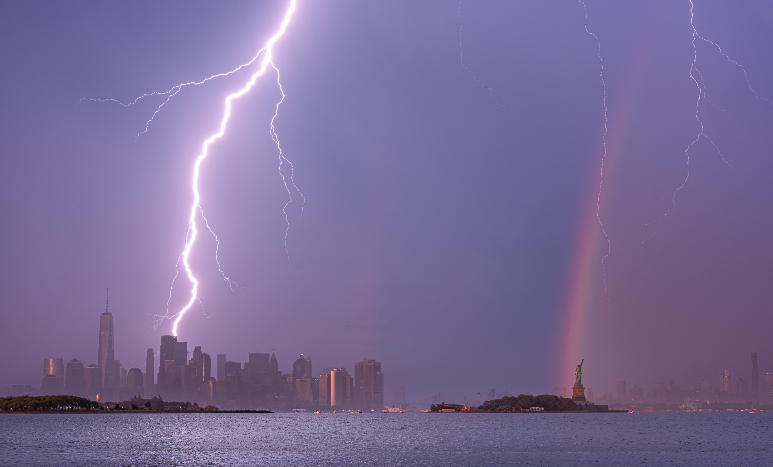Lightning above the Statue of Liberty and city skyline