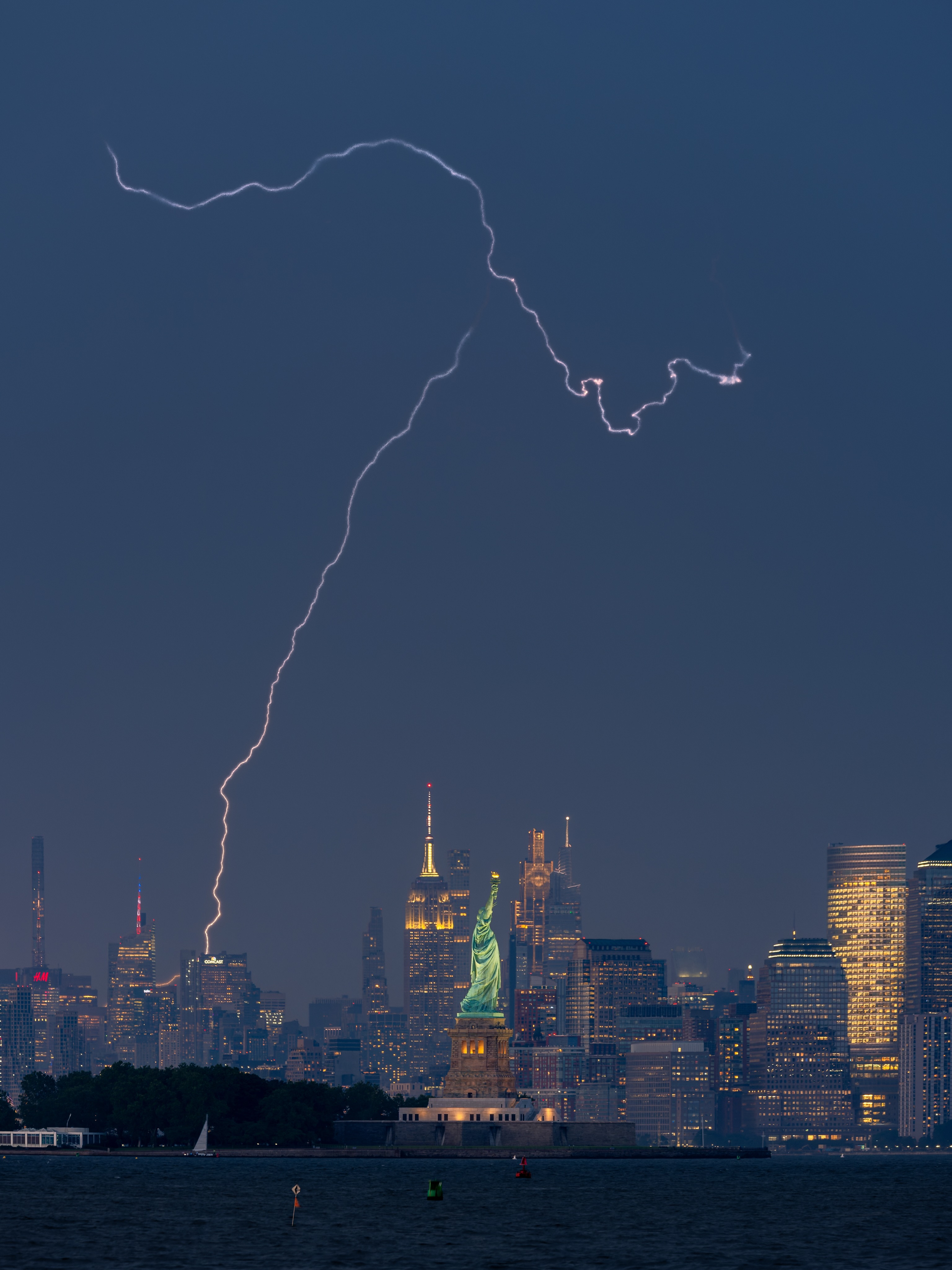 Lightning above the Statue of Liberty and New York skyline