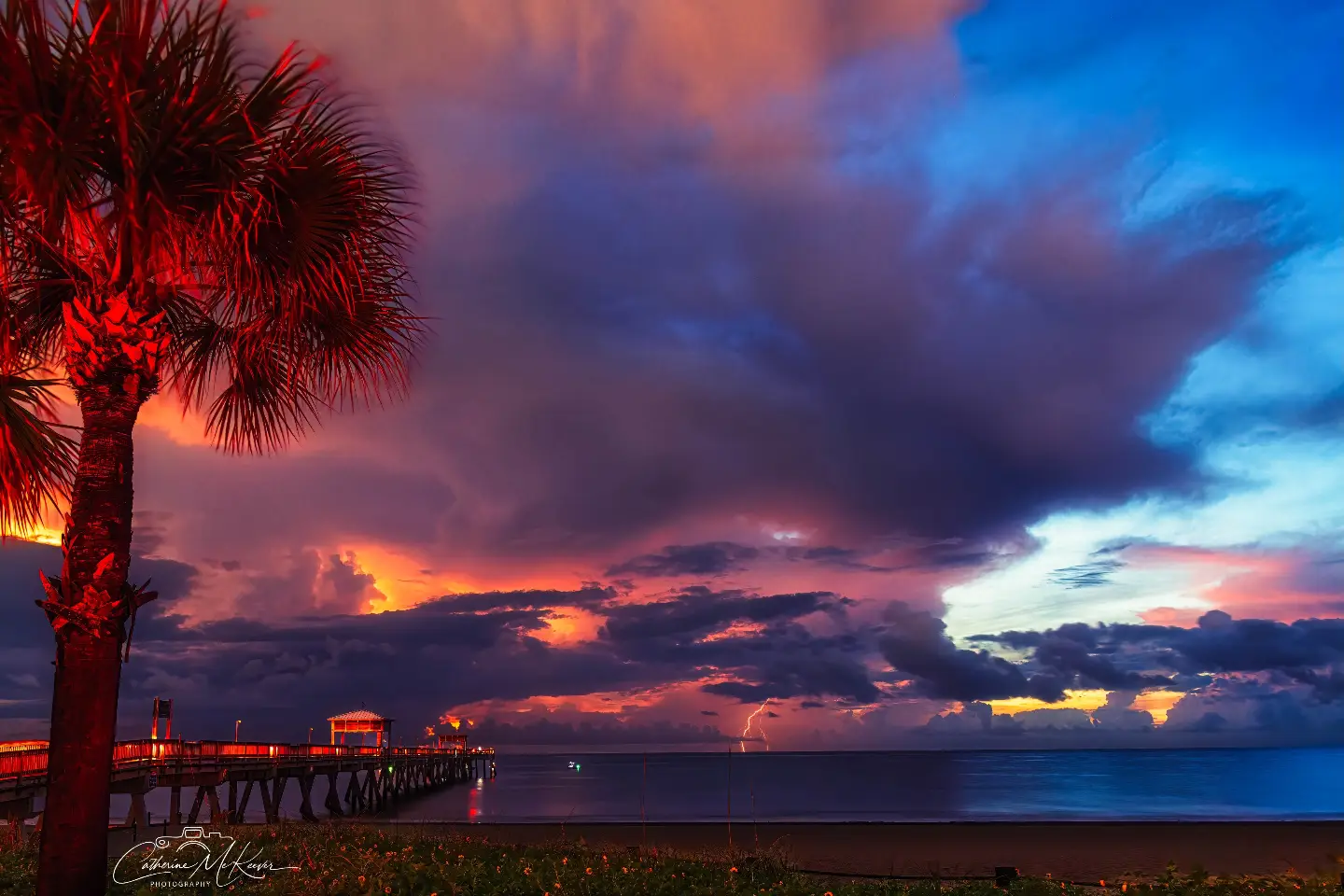 Sunrise with lightning on the horizon