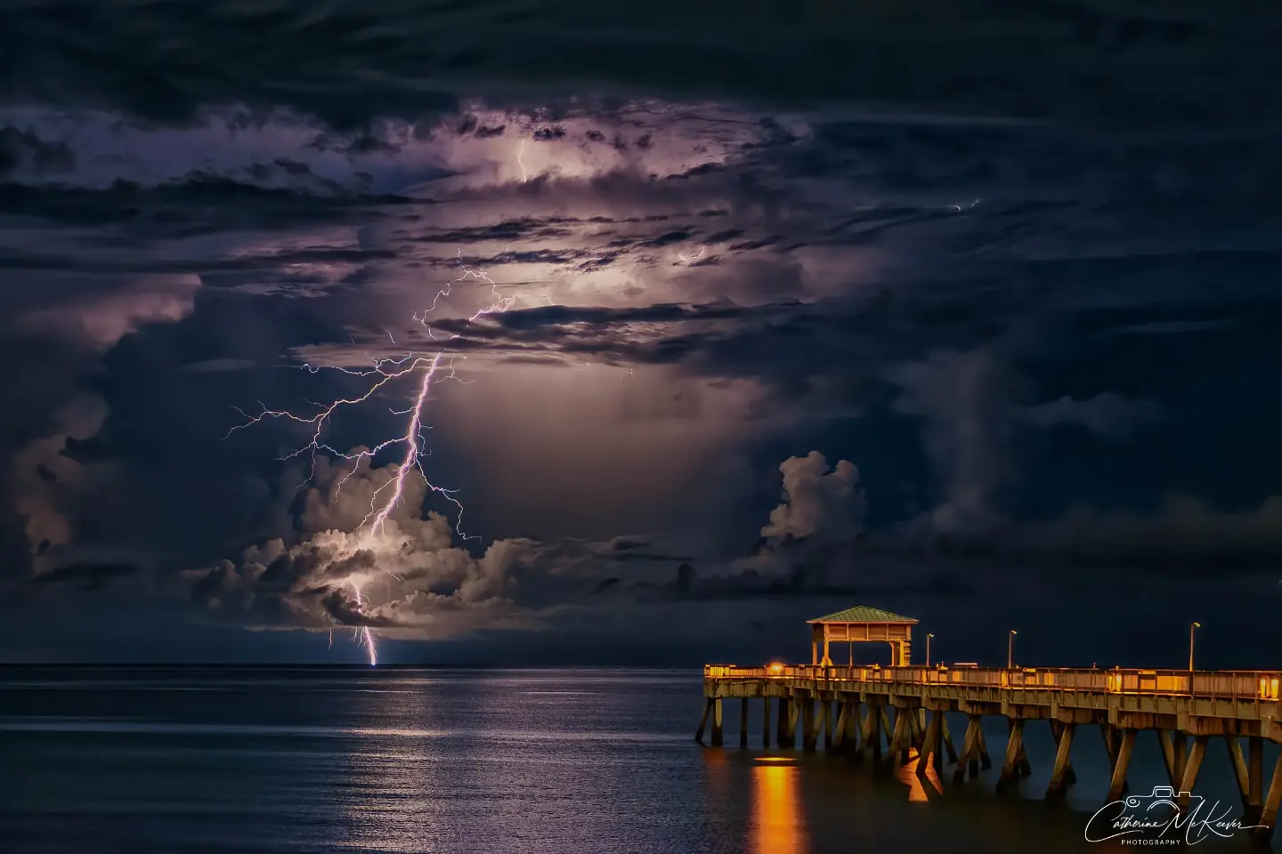 Distant lightning beyond Deerfield Beach Pier