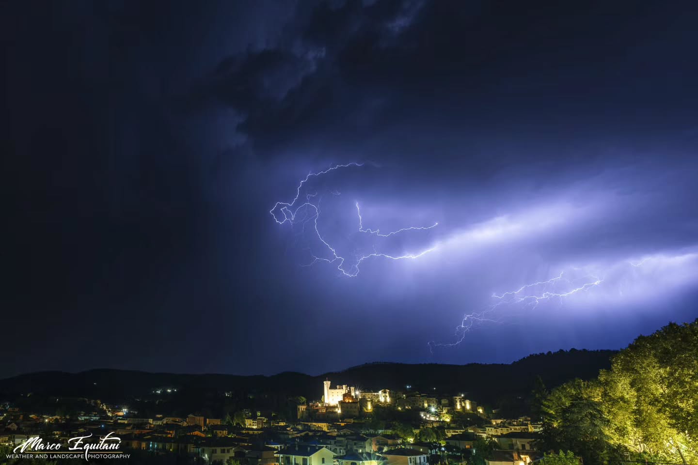 Branching lightning above Bolsena and its castle